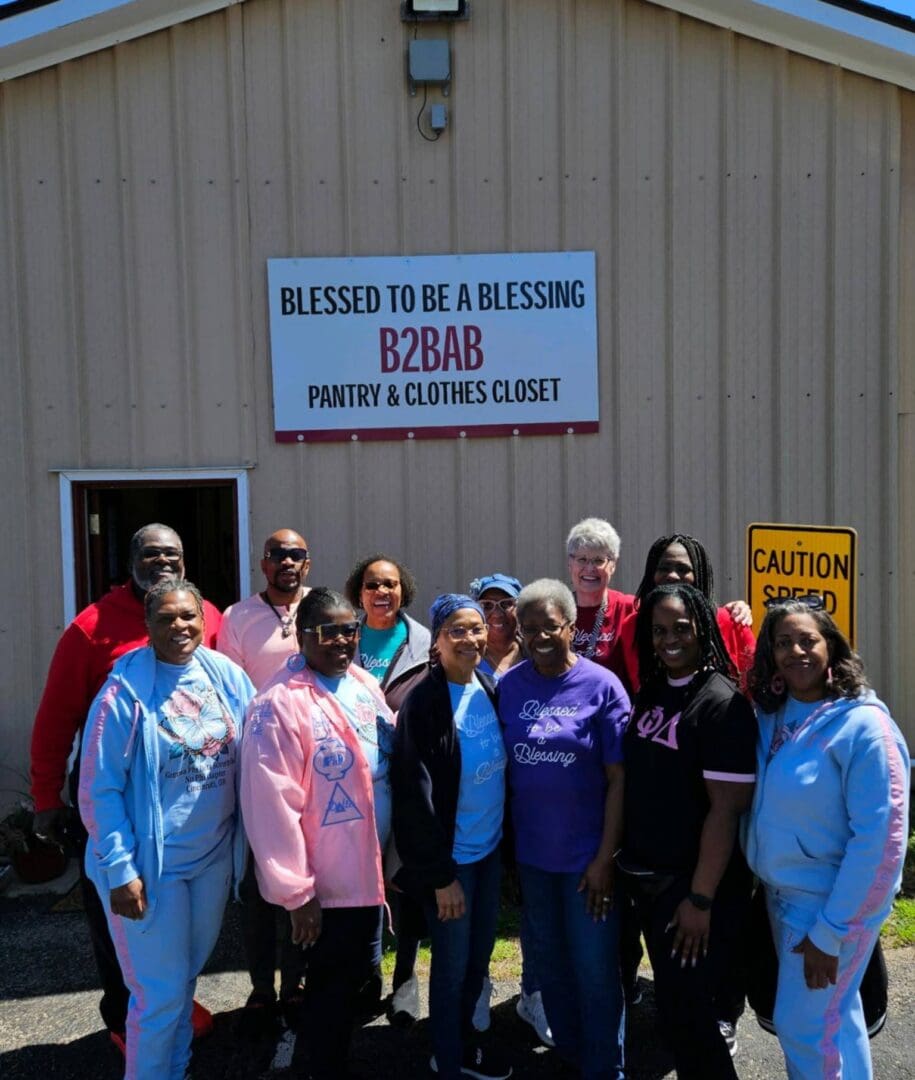 Volunteers outside B2BAB community pantry and closet